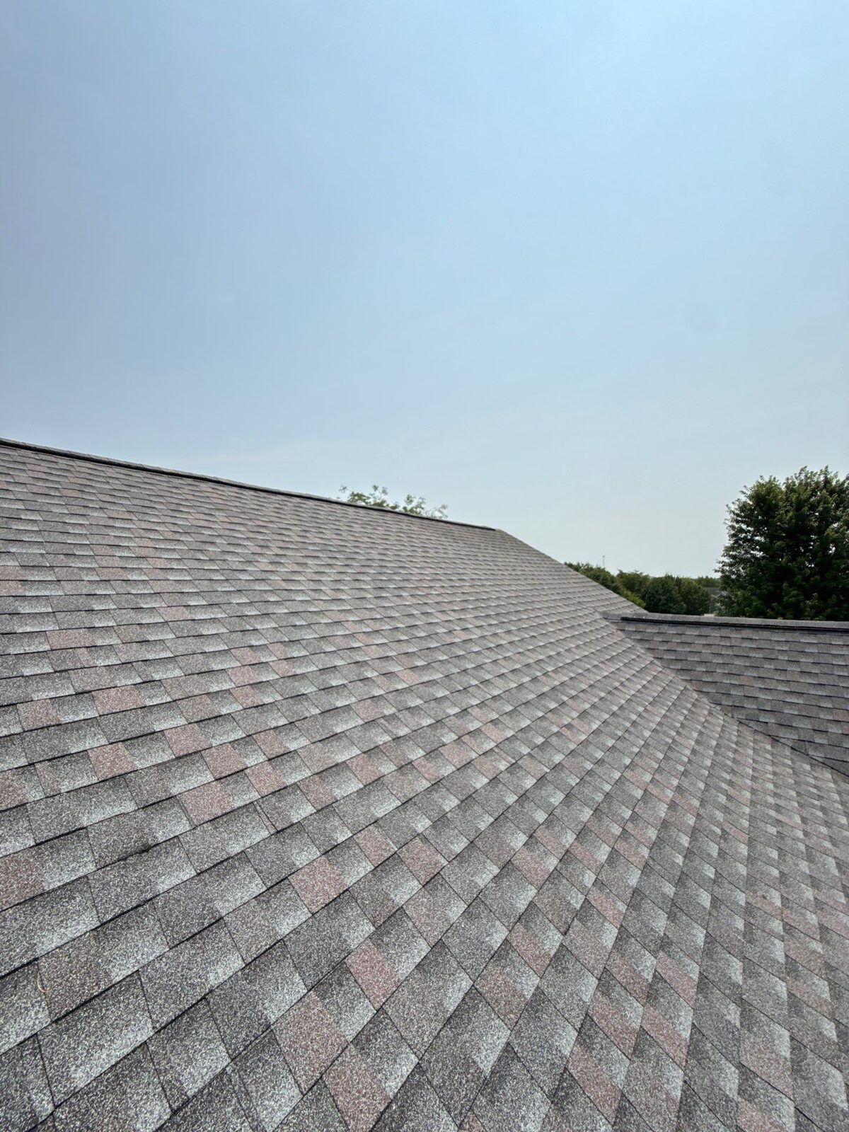 Clean ridge lines across the new roof
